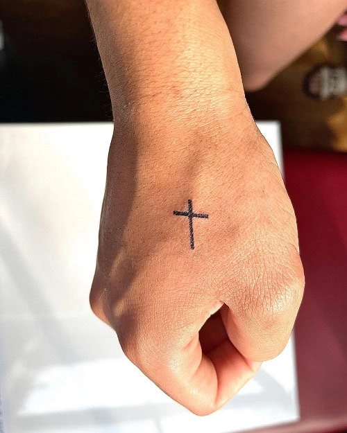 2. Small Cross Tattoo