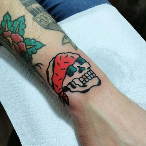 9. Small Skull Tattoo